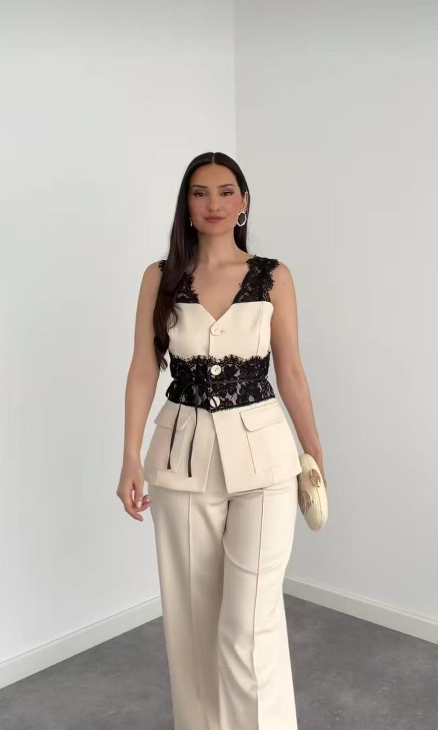 Power suit with lace detailed belt