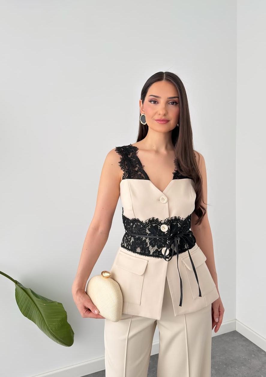Power suit with lace detailed belt