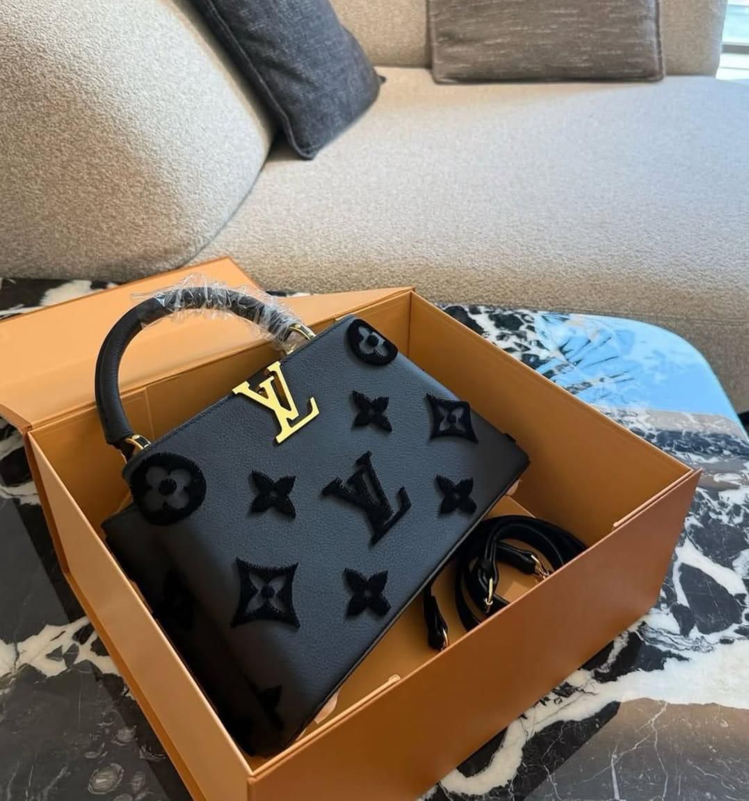 LouisVuitton Capucines in Embossed Monogram Flowers