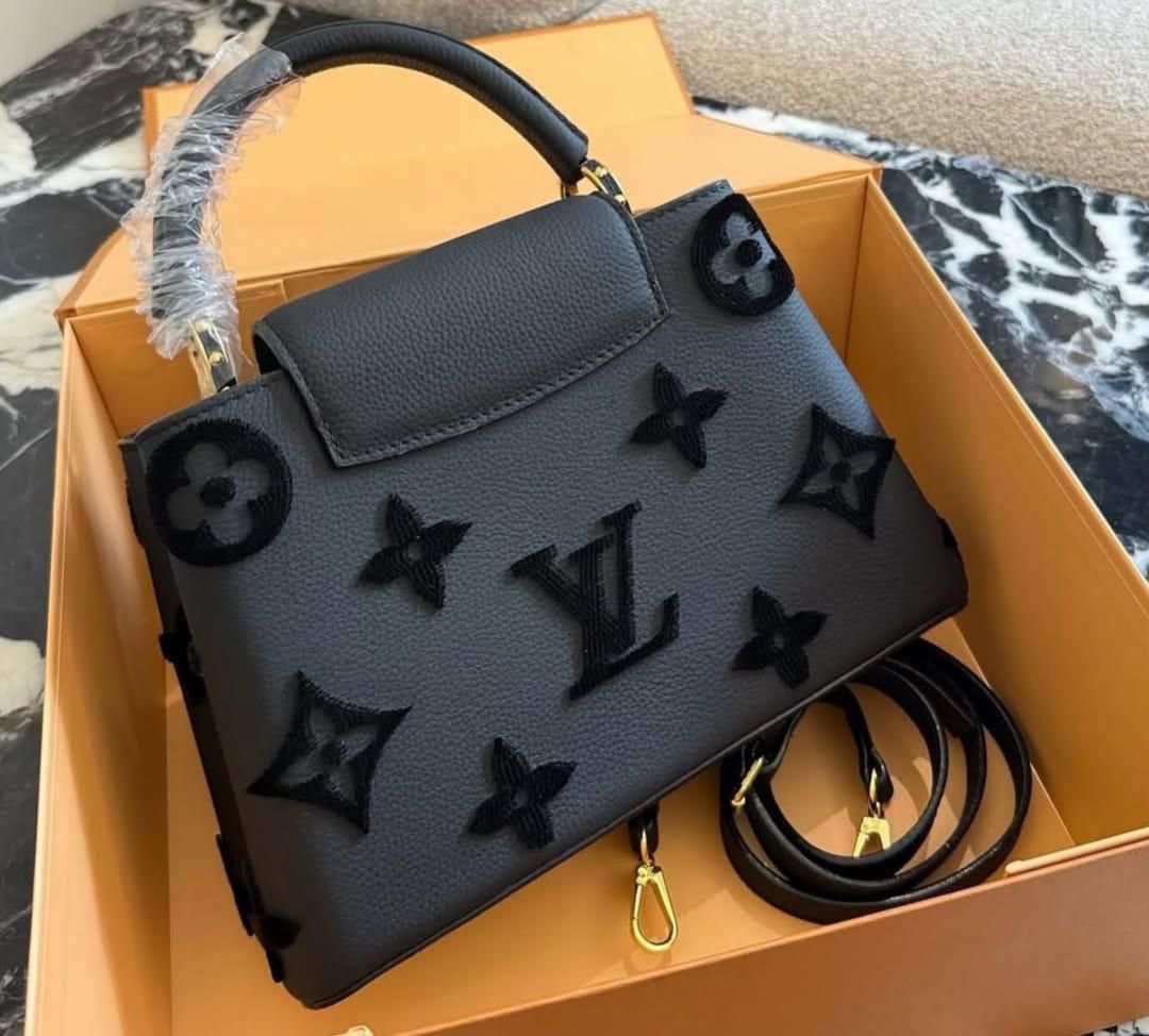 LouisVuitton Capucines in Embossed Monogram Flowers