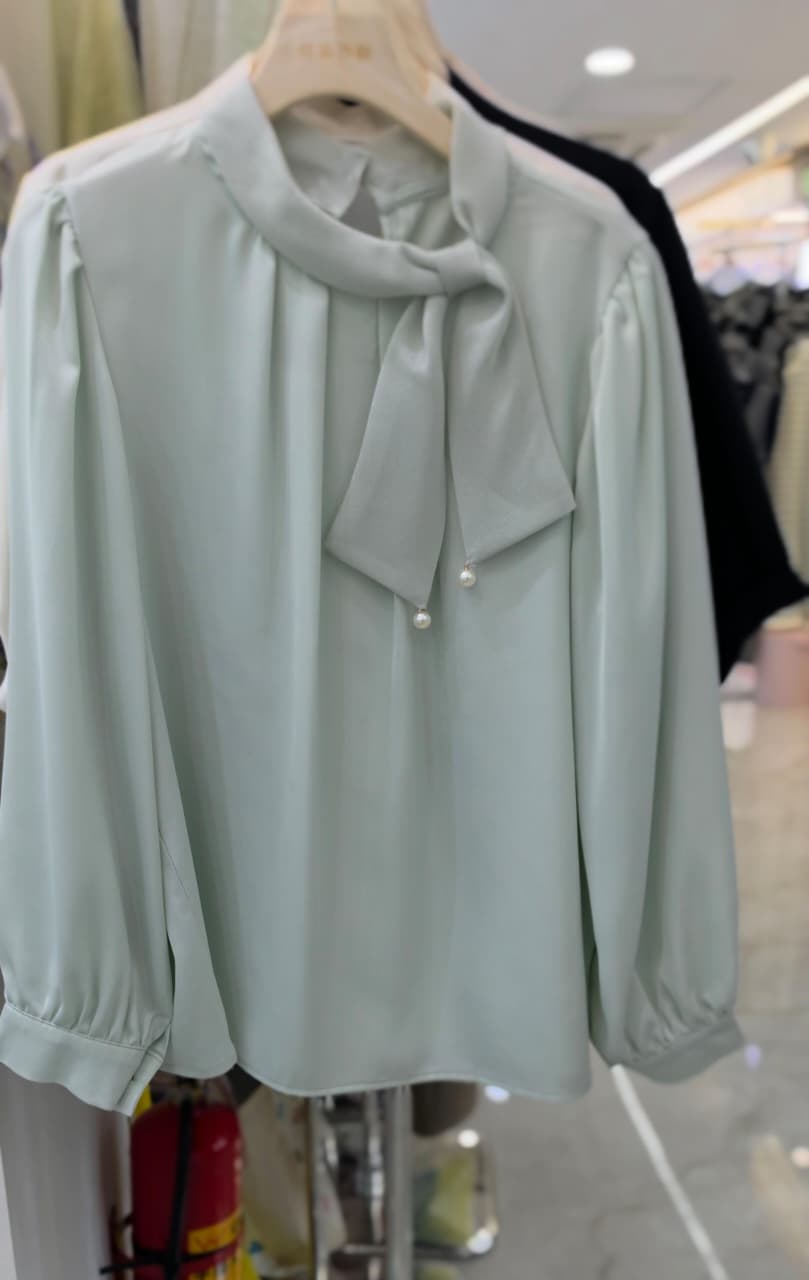 Korean-Style Satin Tie-Neck Blouse with Pearl Detailing.