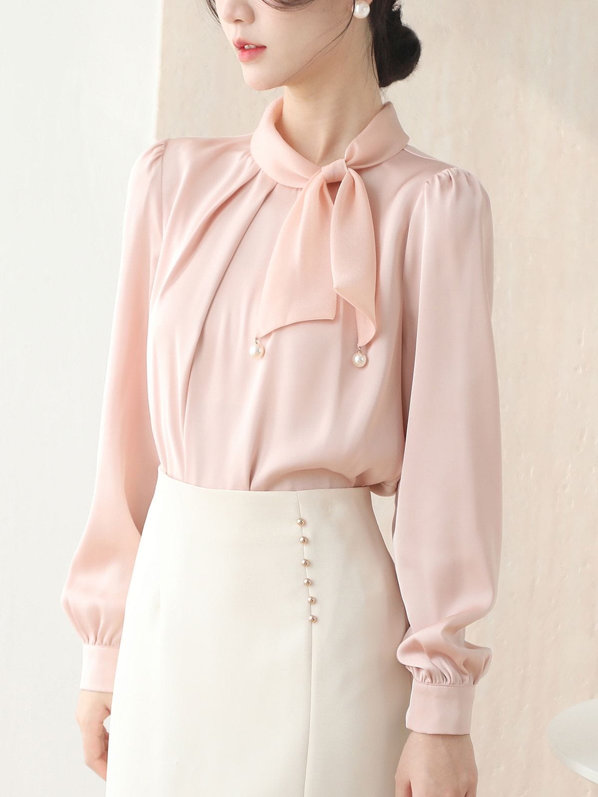 Korean-Style Satin Tie-Neck Blouse with Pearl Detailing.